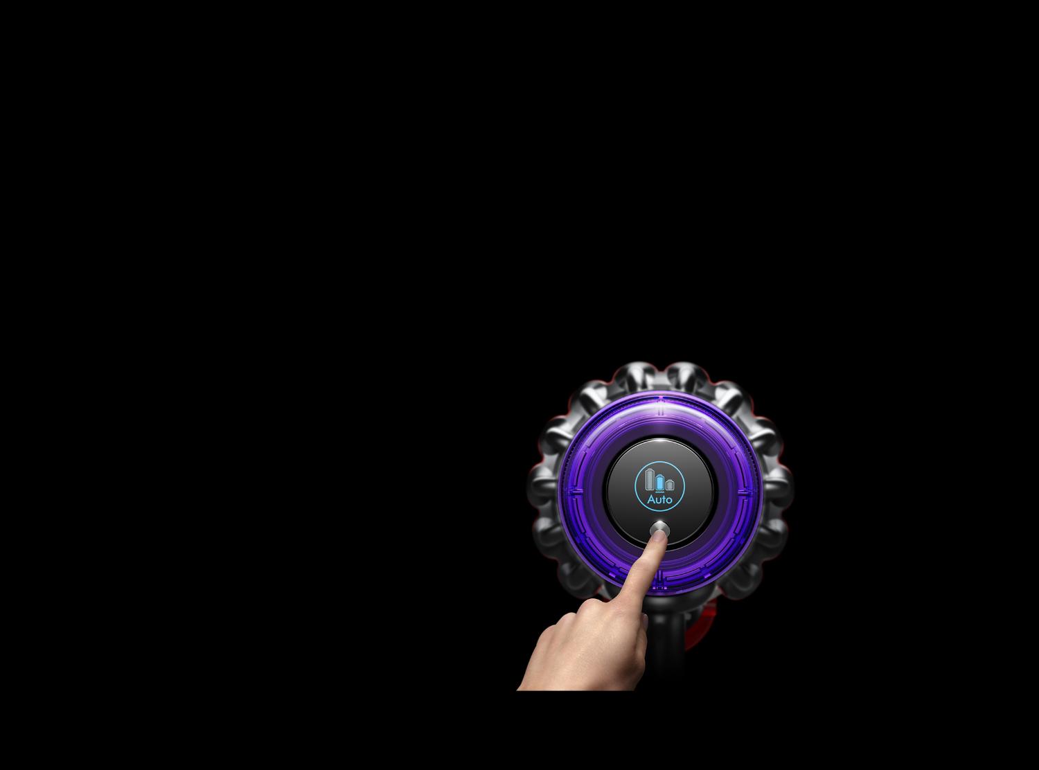 The LCD screen on the Dyson Outsize vacuum as a finger changes the Power mode.