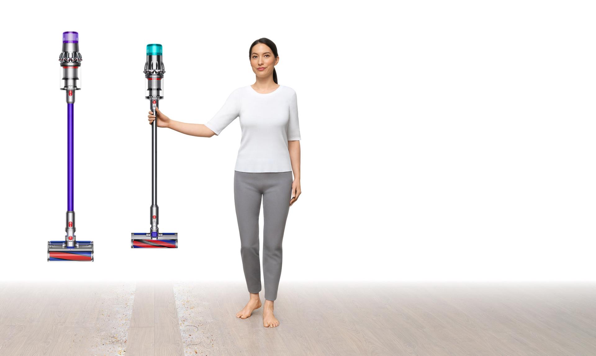 Image of a woman holding a Dyson Digital Slim™ vacuum alongside a V11™.