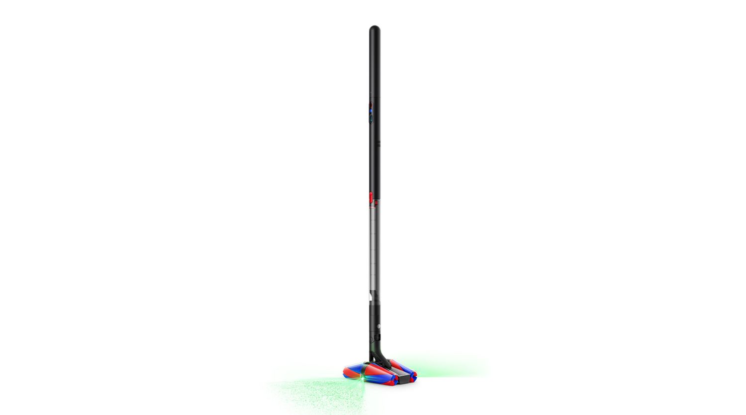 The Dyson PencilVac Fluffycones cleaner seen from an angle with illumination from the cleaner head.