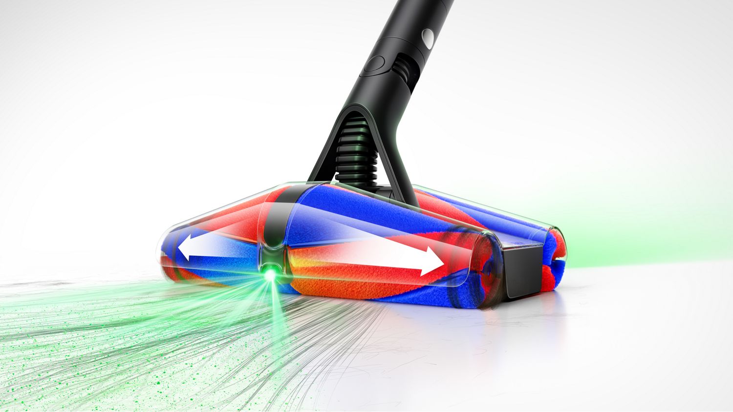 A close up of the Dyson PencilVac Fluffycones cleanerhead illuminated and cleaning up long hair.