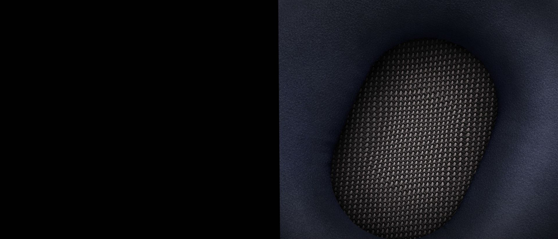 An extreme close up of the open-cell acoustic foam within the earcup.