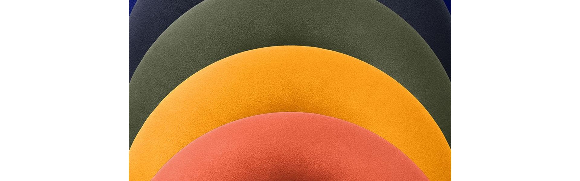 A stack of Dyson OnTrac ear cushions in various colours.