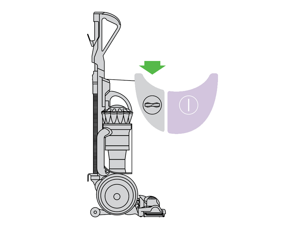 L’image montre l’emplacement du bouton de contrôle de la brosse sur la machine.