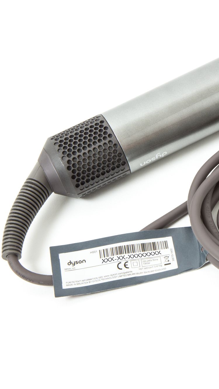 On the power cord near the plug