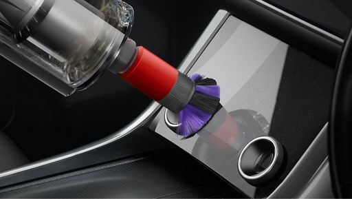 Scratch-free dusting brush cleaning a car interior Scratch-free dusting brush cleaning a car interior