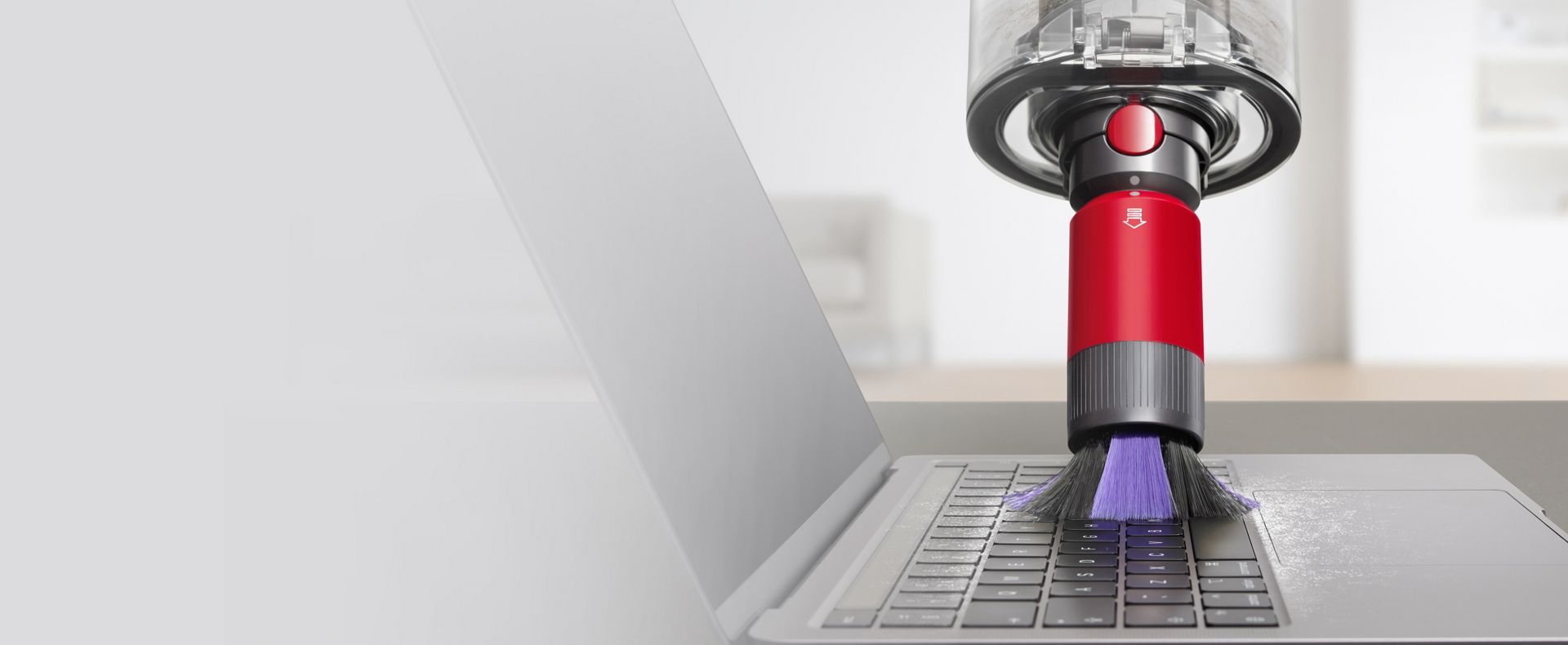 Scratch-free dusting brush cleaning a laptop