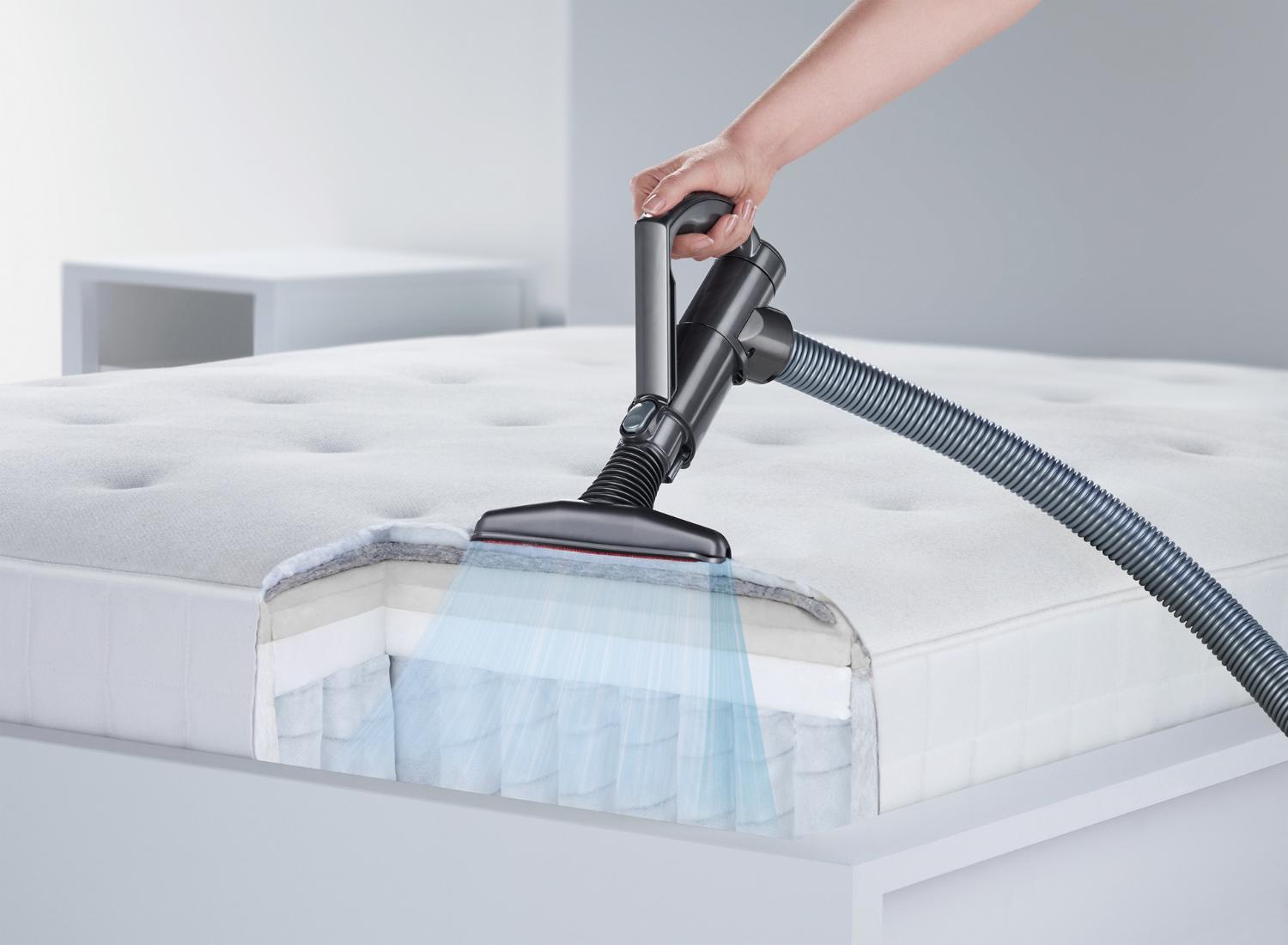 Polsterdüse, die auf einem Bett verwendet wird.