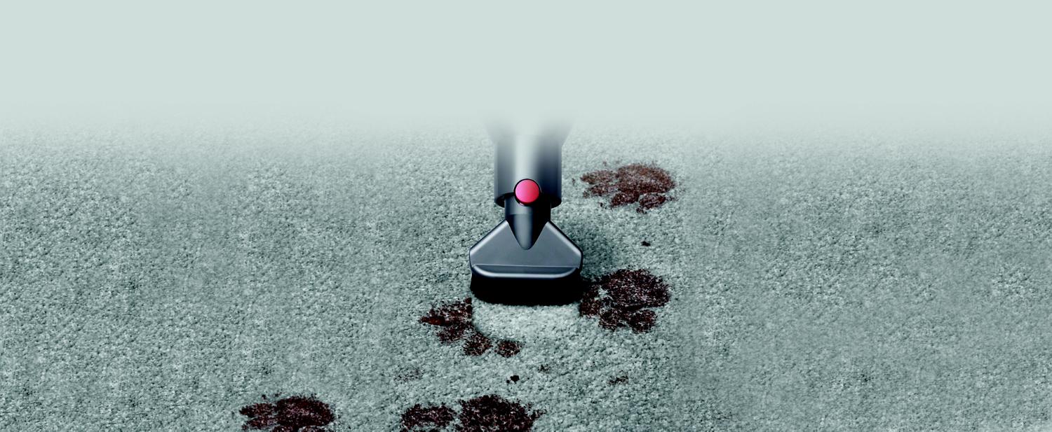 Quick-release stubborn dirt brush on carpet