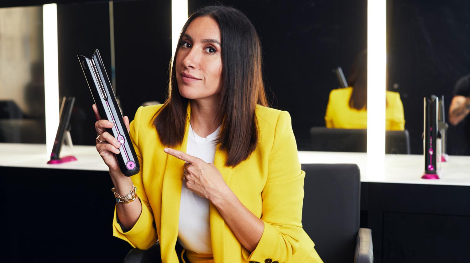 Jen Atkin using the Dyson Corrale straightener.