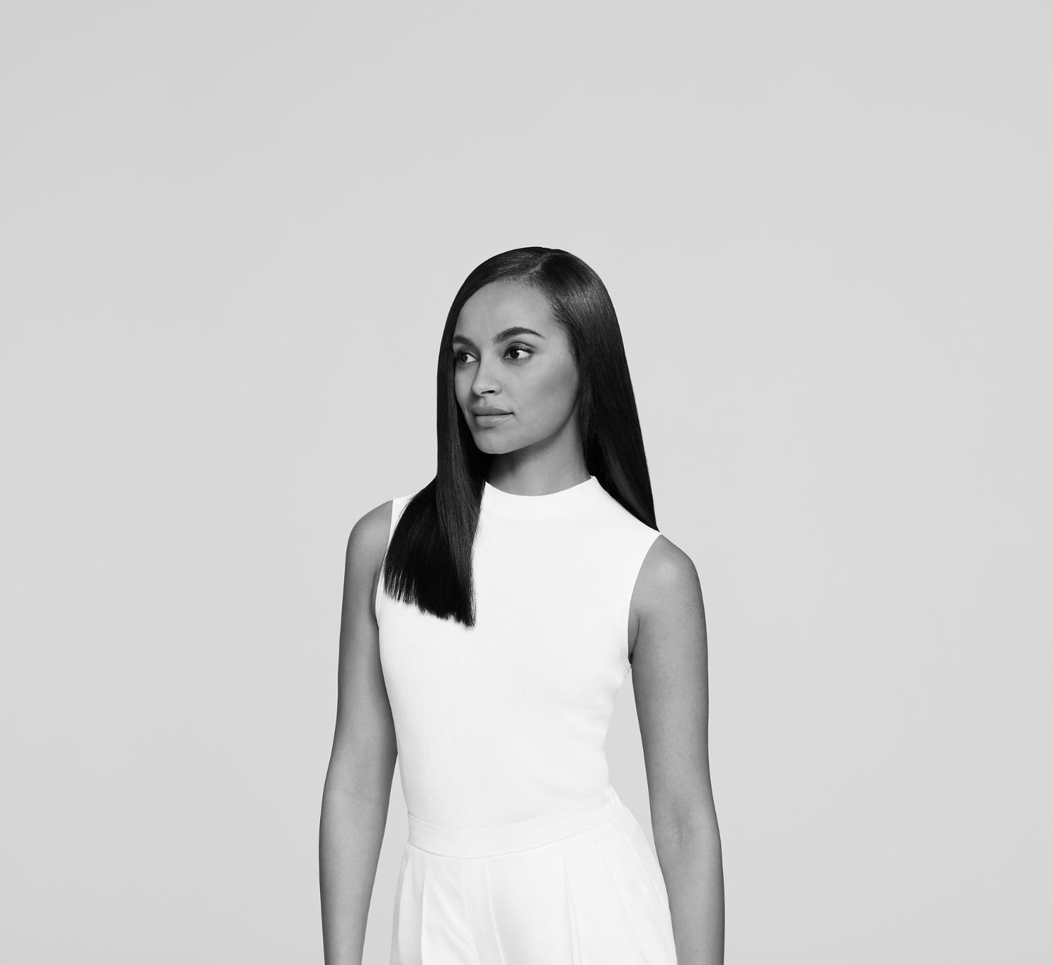 Model with a haircut featuring a smooth and sleek look.