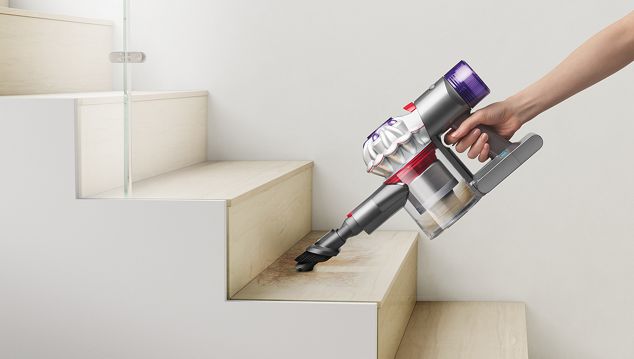 Dyson V8 vacuum handheld vacuuming stairs