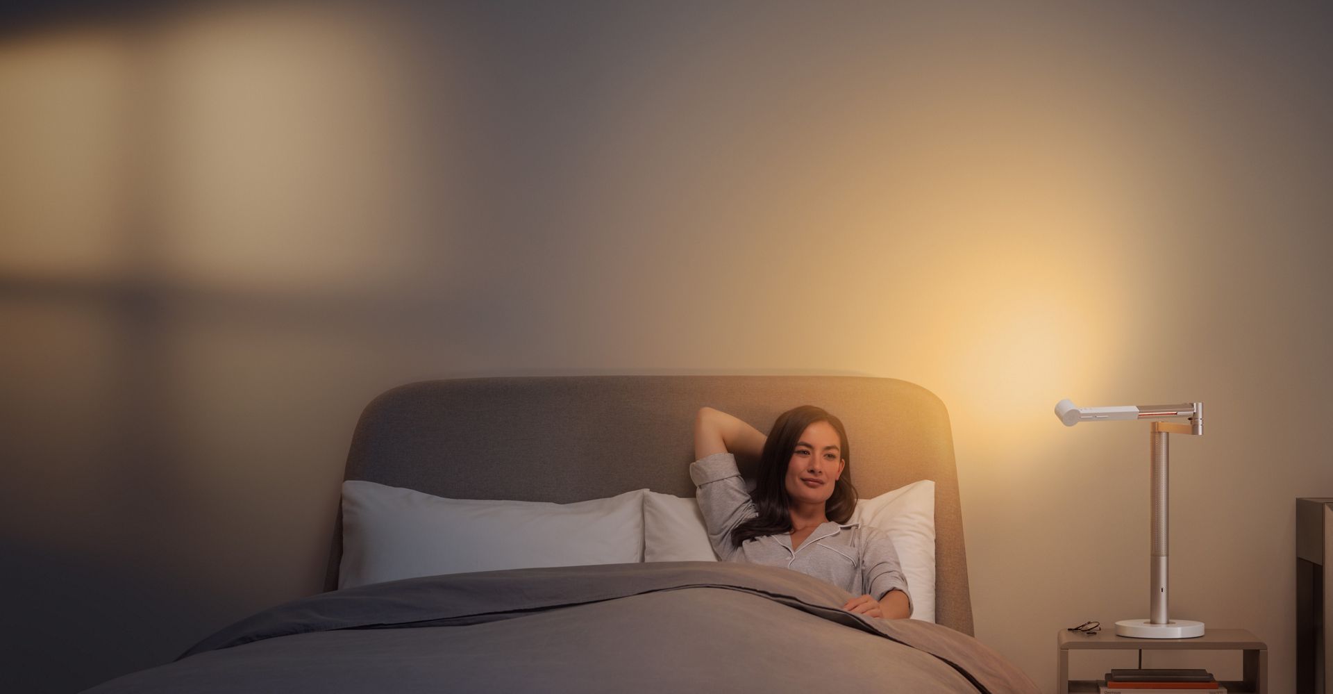 Relaxing light for woman in bed