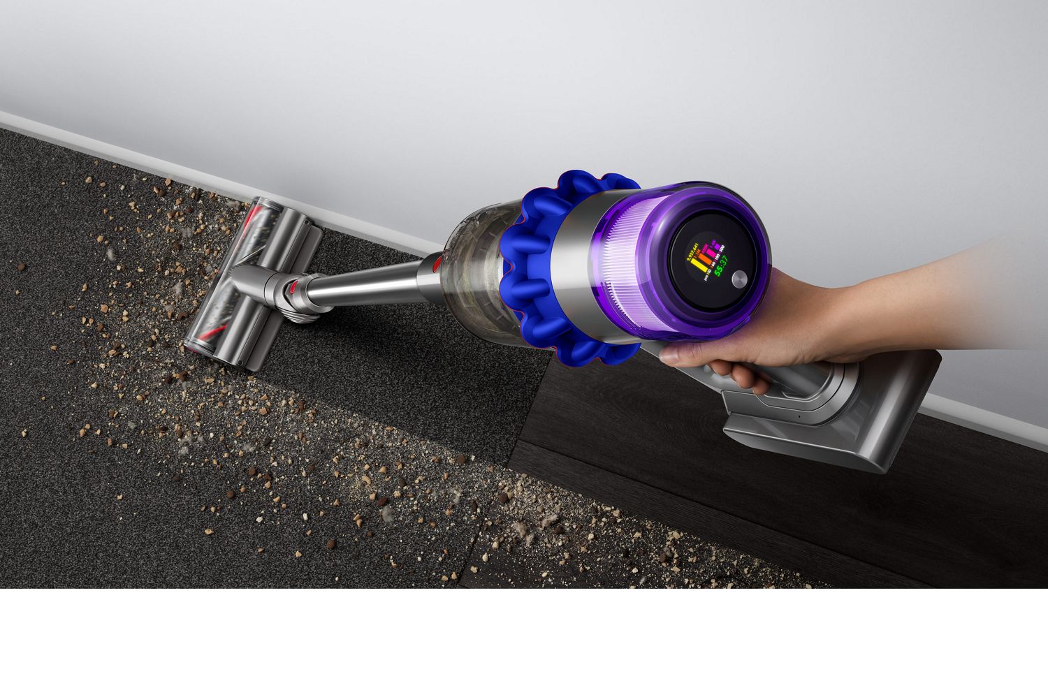 Dyson V15 vaccum cleaner lifting dirt from floor