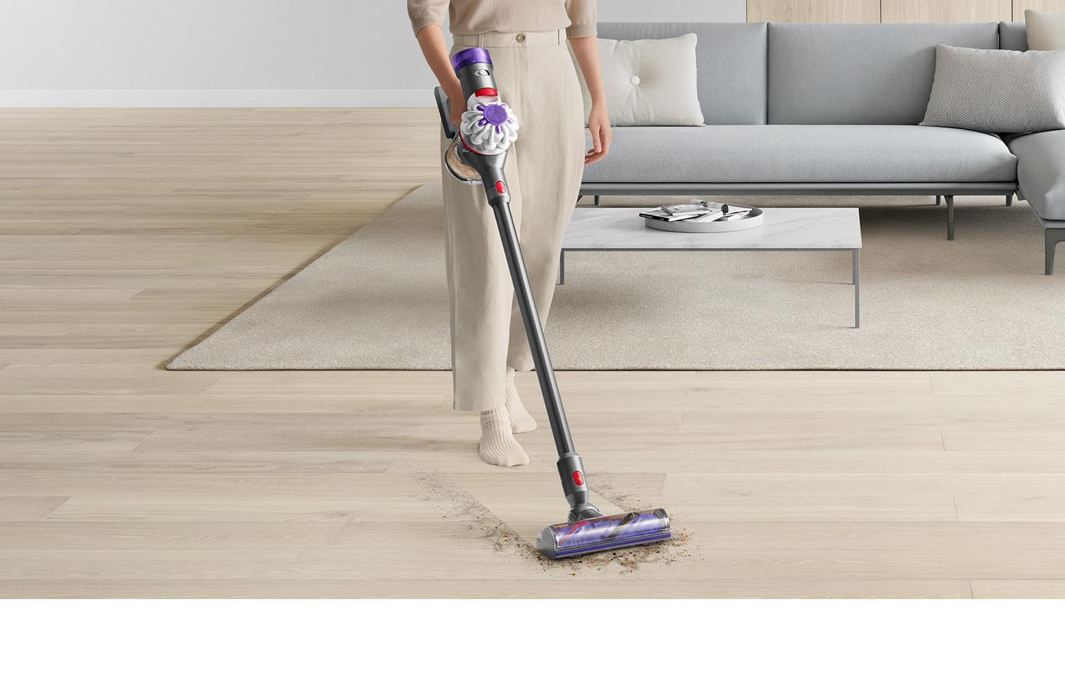 Dyson V8 vaccum cleaner lifting dirt from floor