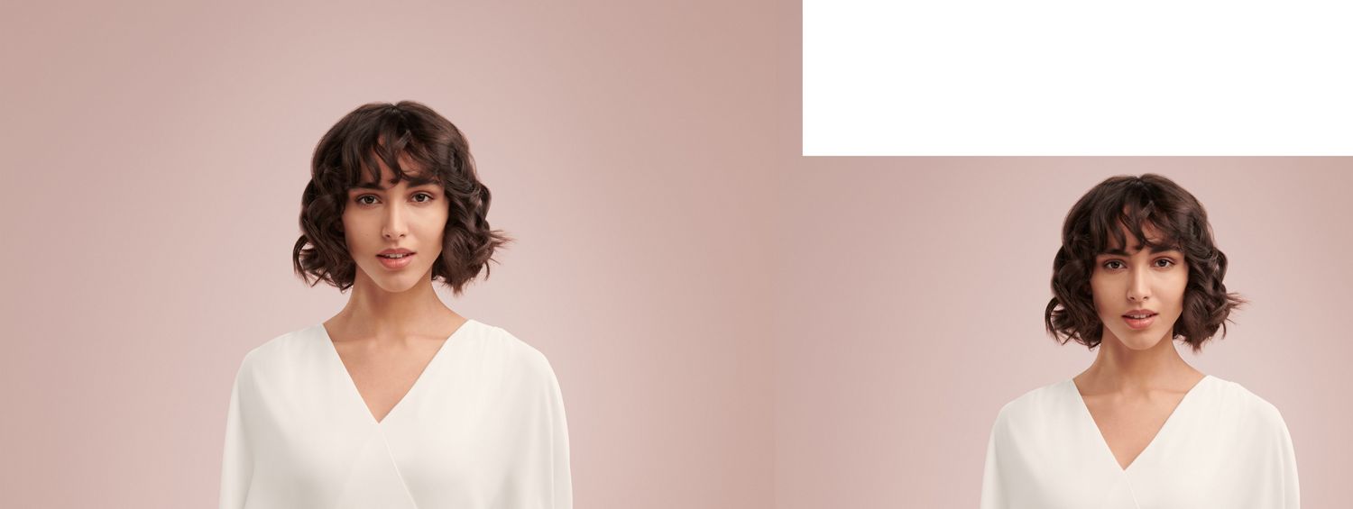 Femme avec des cheveux courts et bouclés sur un fond rose