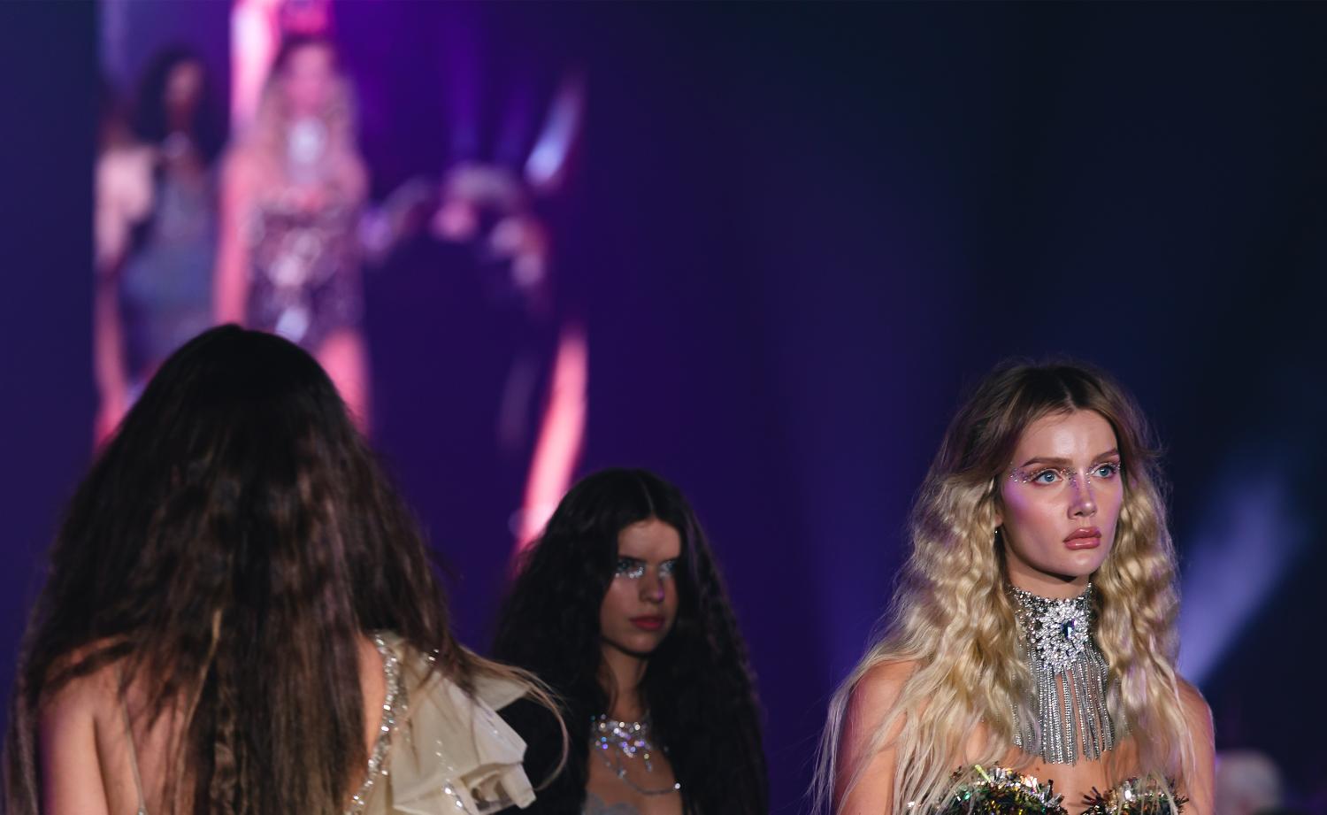 Models walking a runway
