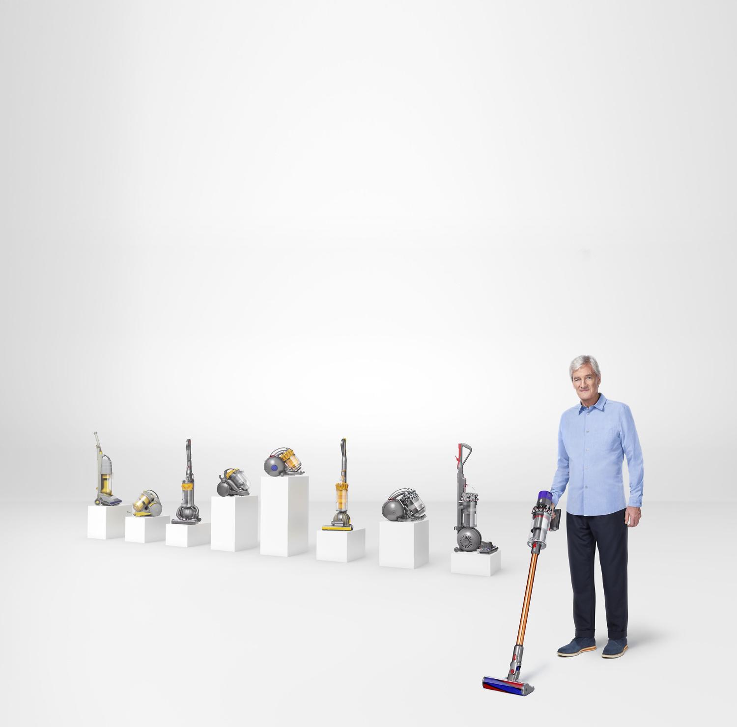 James Dyson with a range of Dyson vacuum cleaners