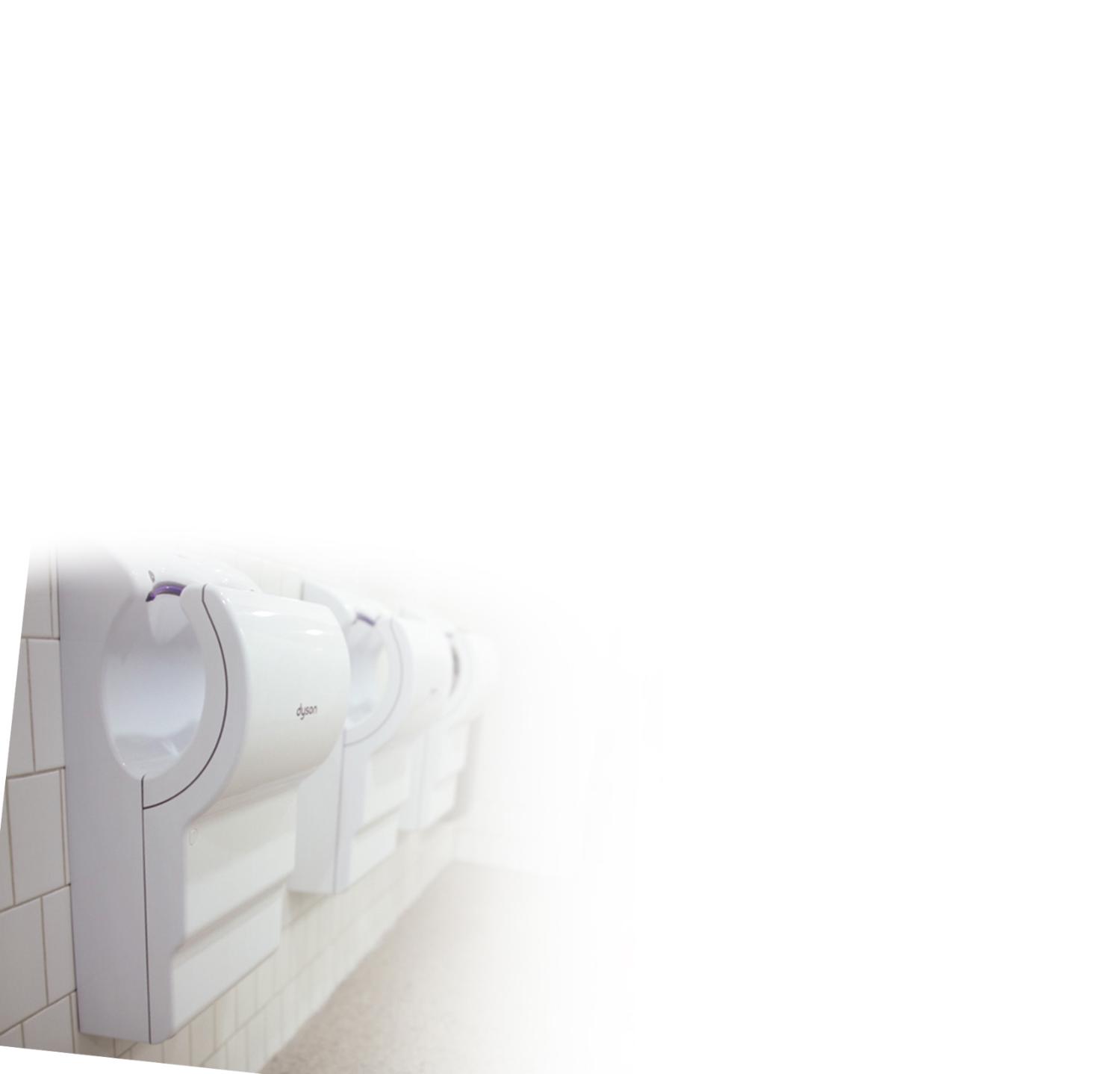 Hands going into Dyson Airblade dB hand dryer