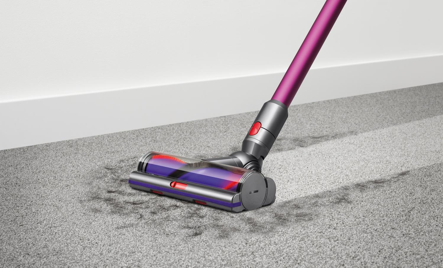 Dyson V10 Animal Pro vacuuming up fur from carpet