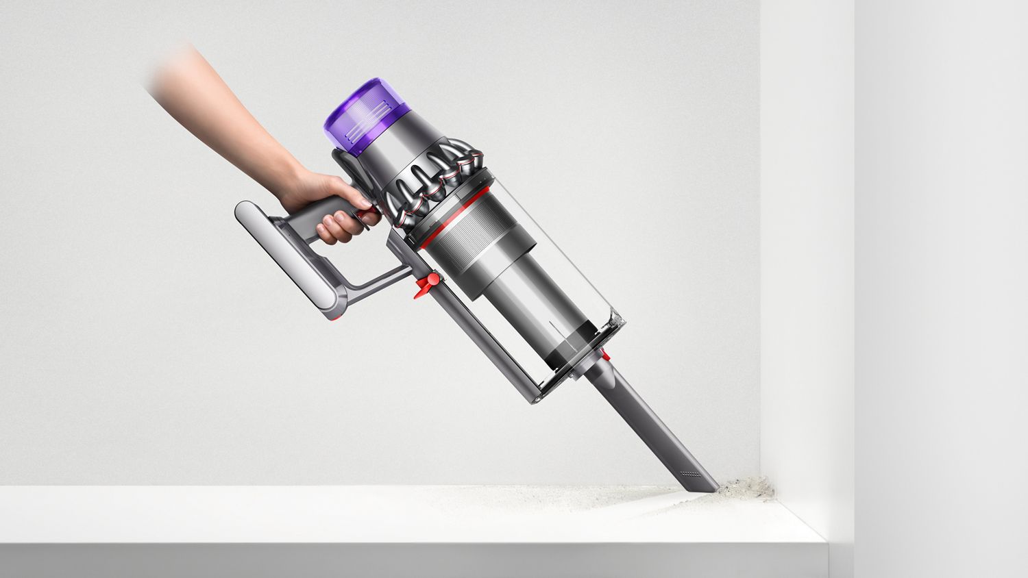 Crevice tool cleaning the corner of a wall