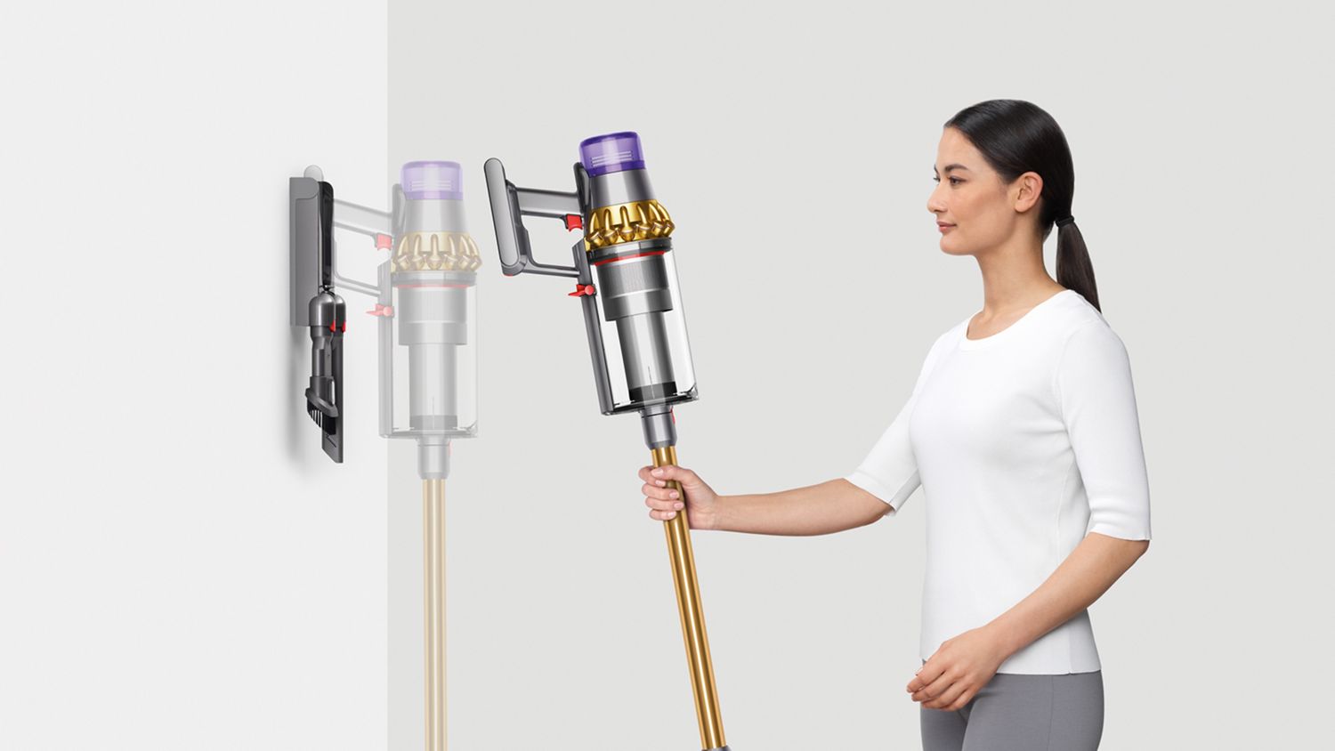 Dyson Outsize Absolute Plus vacuum being put onto docking station