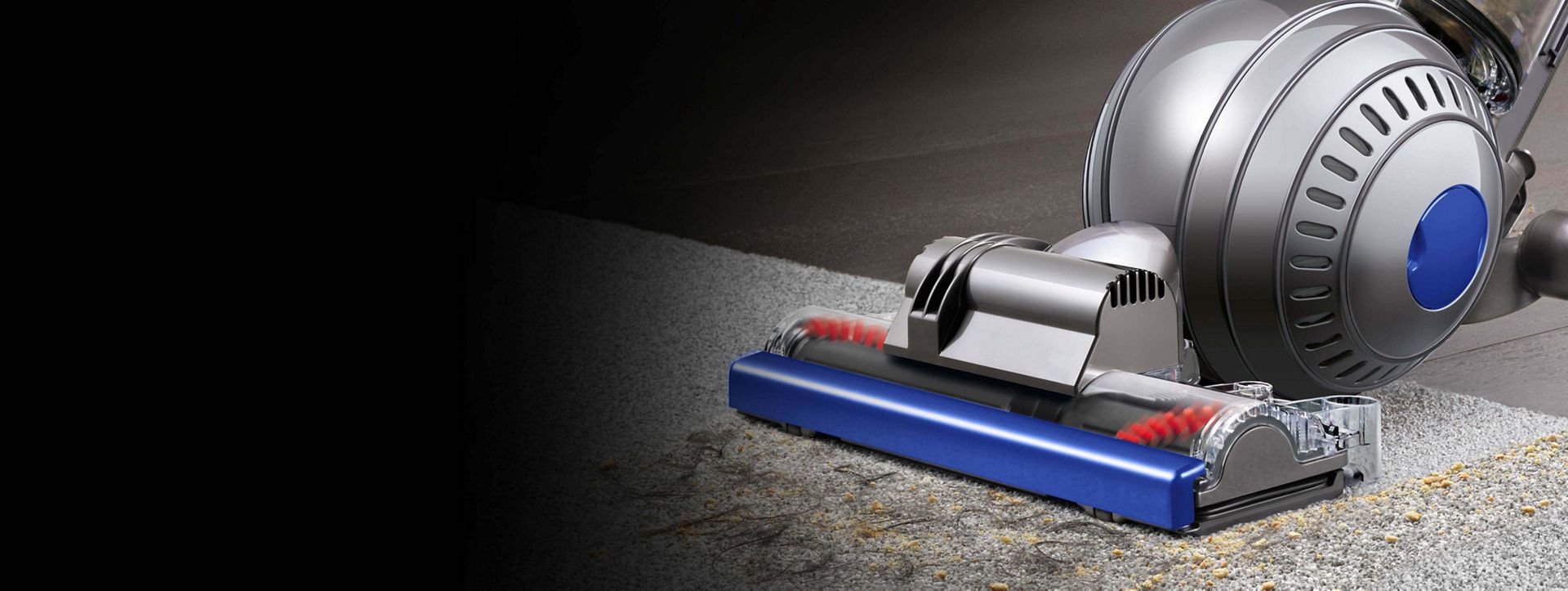 Aspirateur Dyson Ball Allergy+ ramassant des poils d’animaux sur un tapis