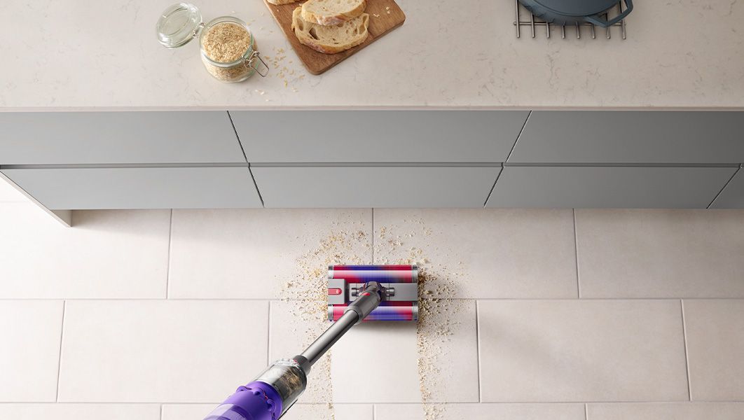 Dyson Omni-glide cleaning up mess in kitchen Dyson Omni-glide cleaning up mess in kitchen