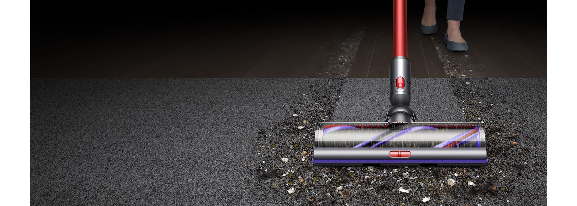 Dyson Outsize vacuum on carpet capturing dust