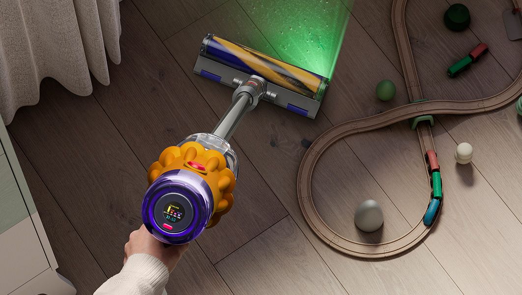 Dyson V12 Detect Slim vacuum with illumination cleaning hard floors in a child's room