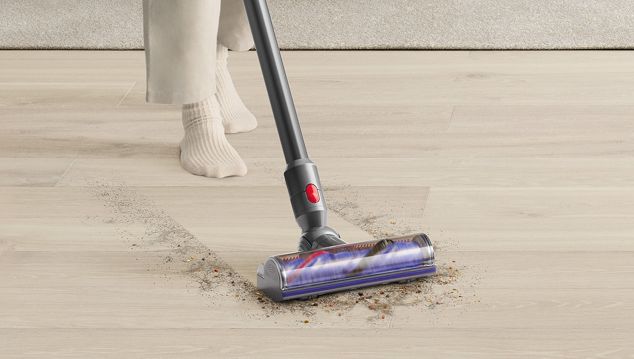  Dyson V8 vacuum vacuuming floors