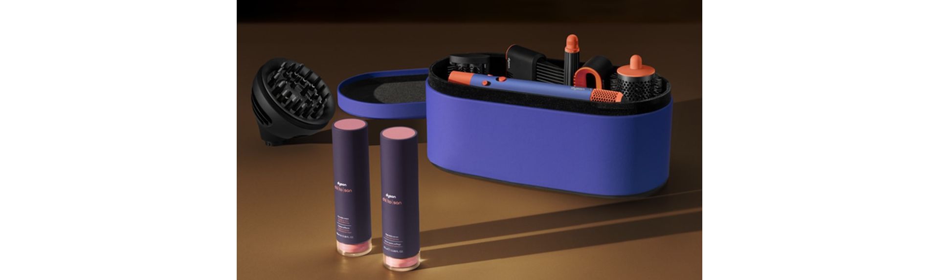 Multistyler Airwrap id oraz dwie tubki kosmetyków do stylizacji Dyson Chitosan